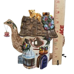 ✅Tetera decorativa casa de pájaros luz de té candelabro gato en la parte superior arte de cerámica - Imagen 1 de 12