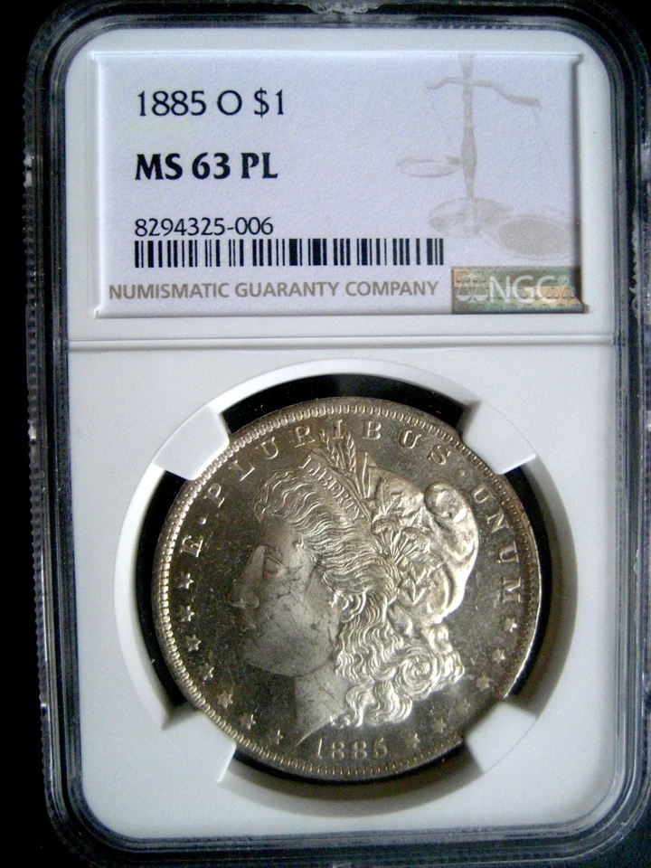 1885-O Morgan Dollar, Graded: NGC MS-63 PL  Proof-Like Mirrors ++++ - Image 1 of 4