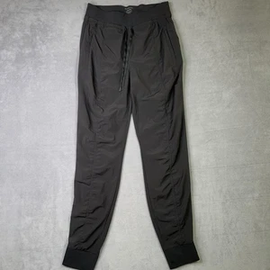 Athleta Attitude Pant Damen 8 Tall schwarz Jogginghose Stretch Reißverschlusstasche Reisehose - Bild 1 von 9
