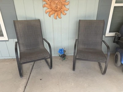 glass table and 2 spring back  patio chairs - Image 1 of 4