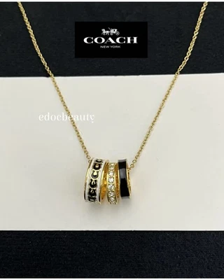 Collar Coach Monograma Marfil Esmalte Oro Anillo Dije | Regalo, Nuevo en Negro Foto 1 de 3