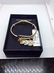 $39 Lucky Brand gold  tone hinged hook charm cuff  bracelet  DD53 - Picture 1 of 4