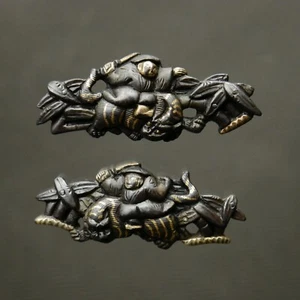 Menuki set, man fights with a tiger   in bamboo forest, gold inlays. B230921 - Picture 1 of 3