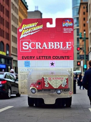 1999 INTERNATIONAL CARGO TRUCK "SCRABBLE" 1/64 JOHNNY LIGHTNING JLSP257 - Image 1 of 4
