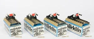 4x MÄRKLIN BOXED HO 7190 M TRACK PUFFERS WITH SCREWS VERY NEAR MINT OR MINT - Bild 1 von 2