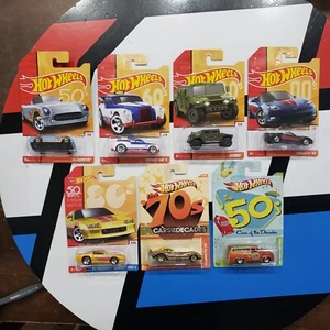 Hot Wheels CARROS DE LAS DÉCADAS 1/64 Lote de 7 Nuevos Sin usar, en caja - Imagen 1 de 16