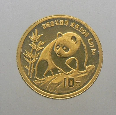 Moneda panda de oro de 10 yuanes de China 1990 de 1/10 oz .999 fina fecha grande Foto 1 de 2