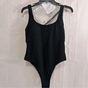 Traje de baño descarado negro grande One Piece para mujer con textura y espalda redonda - Imagen 1 de 7