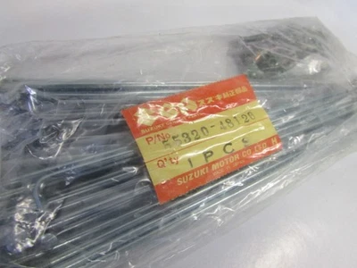 Juego de radios de rueda delantera originales OEM 55320-48520 Suzuki DS100 TS100 1981 nuevo de stock Foto 1 de 2