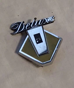 Toyota Corolla Deluxe KE20 Plastic Badge Emblem Genuine - Picture 1 of 3