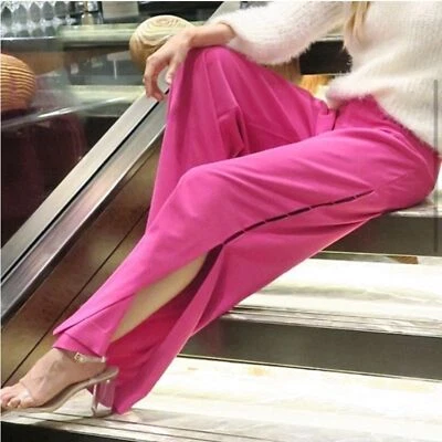 Pantalones plisados fucsia acampanados cintura alta Alice + Olivia Shavon LEER Foto 1 de 4