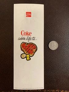 Etiqueta colgante de botella de Coca Cola 1976 vintage - Coca-Cola añade vida a... anuncio publicitario - Imagen 1 de 1