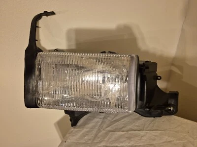Carcaça do farol 1994 a 2001 Dodge Ram lado esquerdo do motorista com lâmpada - Imagem 1 de 4
