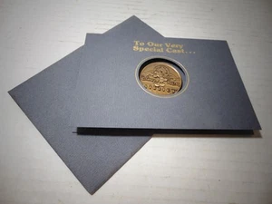 1989 MGM Studios Opening Cast Member Gift Coin Medallion on Card with Envelope - Picture 1 of 6