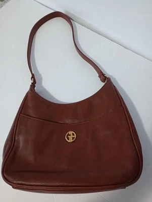 Bolso de mano Giani Bernini de cuero marrón con múltiples bolsillos  Foto 1 de 4