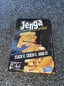 Hasbro Jenga Gold Game - Stack It Crash It Grab It - New/Sealed - Picture 1 of 3