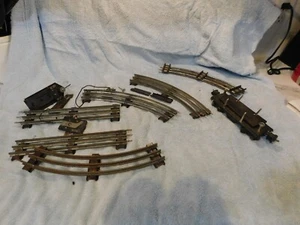 Lionel Track Pieces and a "Flat Car" - Picture 1 of 5