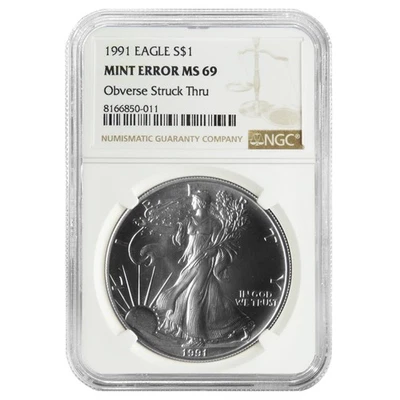 1991 $1 American Silver Eagle NGC MS69 Mint Error Obverse Strike Thru - Image 1 of 2