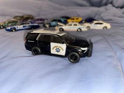 Greenlight 1/64 scale Hot Pursuit 2021 Chevrolet Tahoe Police California Highway - Image 1 of 4