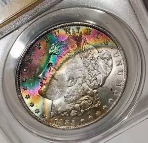Dólar de plata O Morgan 1885 tono arco iris ANACS MS63 brillante arco color neón - Imagen 1 de 5