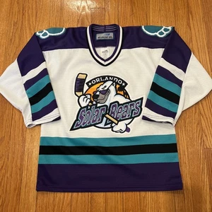 Camiseta deportiva vintage años 90 Bauer Orlando Solar Bears IHL juvenil talla L/XL azul púrpura - Imagen 1 de 5