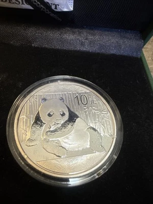 Moneda panda de plata china 2015 10 yuanes RMB 1 oz 999 en cápsula original gema 熊猫银币 Foto 1 de 4