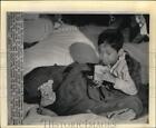 1975 Press Photo South Vietnamese orphan boy drinks milk in San Francisco, CA