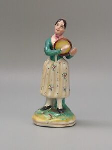 An early Staffordshire flat back figurine Lady with tambourine