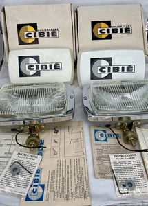 NOS 175 CIBIE FOG LIGHTS PAIR WITH COVERS AND INSTRUCTIONS IN ORIGINAL BOXES - Picture 1 of 12