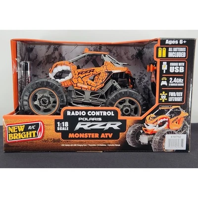NEW Bright Polaris RZR Monster ATV 1:18 Scale Radio Control Car - Orange - Image 1 of 4