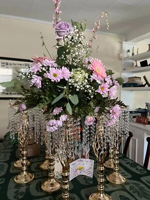 Centros de mesa de flores de latón y cristal Foto 1 de 2