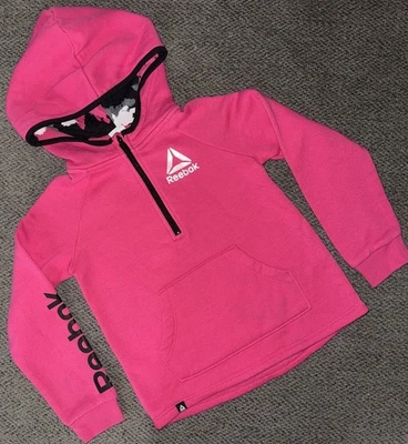 Sudadera con capucha Reebok rosa magenta para niña talla 5T Foto 1 de 4