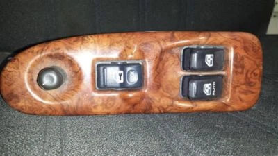 00 01 02 03 04 SILHOUETTE L. FRONT DOOR SWITCH DRIVER'S WINDOW WOOD GRAIN TRIM - Image 1 of 3