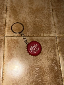 Fallout Metal Nuka Cola Bottle Cap Keychain Gamers Gift - Picture 1 of 3
