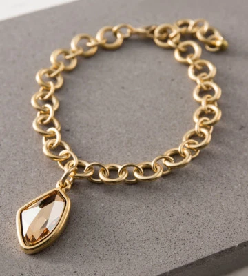 Exclusive Yellow Gold Bracelet With Strikingly Cut Swarovski Crystal Pendant    - Изображение 1 из 4