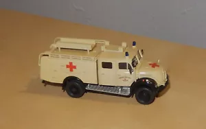 Preiser 31218 Magirus F 150 D 10 A TLF16 DRK Rotes Kreuz H0 1:87 UNIKAT - Bild 1 von 5