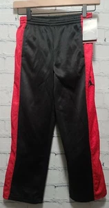 Pantaloni felpati bambino NIKE AIR JORDAN Jumpman THERMA FIT neri taglia 7 rossi B10 - Foto 1 di 7