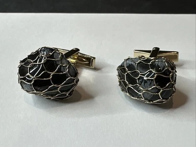 Gemelos de piedra envueltos en oro vintage Foto 1 de 2