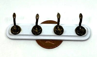 Dolls House Miniature 4 Metal Coat Hooks On A White Wooden Bar Tumdee 1:12 Scale - Image 1 of 4