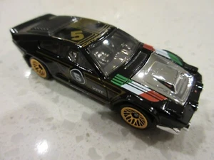 2021 Hot Wheels Dimachinni Veloce Black Nightburnerz 1:64 DIECAST Toy Race Car - Picture 1 of 5