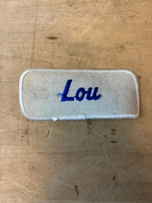Vtg 70s LOU Sew On Embroidered Clothing Jacket Uniform Name Patch BLUE & WHITE - Image 1 of 3