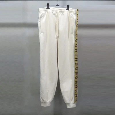 Calça jogger Gucci 630713 algodão marfim intertravado GG jersey pista - GG - Imagem 1 de 4