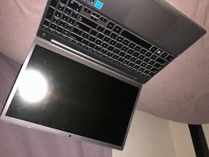 samsung laptop, ok condition it’s a little broke on the side idk what model - Picture 1 of 5