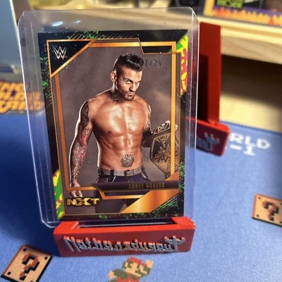 2022 Panini WWE NXT 2.0 #24 Corey Graves #/25 Splash Tie Dye & Voices Numbered - Image 1 of 4