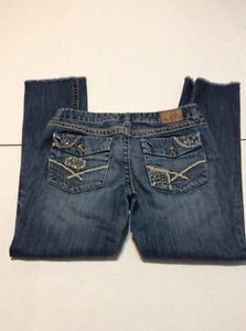 Pantalones de mezclilla BKE Lexi elásticos ajustados tiro bajo desgastados adornados para mujer 28 - Imagen 1 de 8