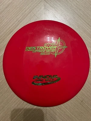 Innova Star Destroyer Domey 168 g Red & Gold Distance Driver Disc Golf Penned Wt - Image 1 of 4