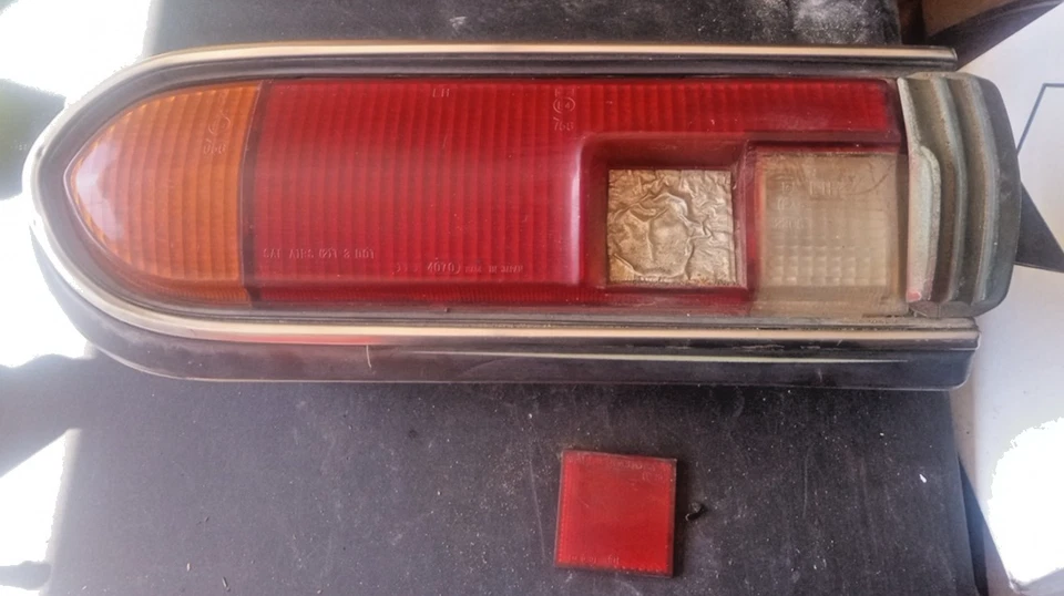 1974-1978 Datsun B210 левый задний фонарь в сборе отделка OEM LH LOC-111DG - Изображение 1 из 4