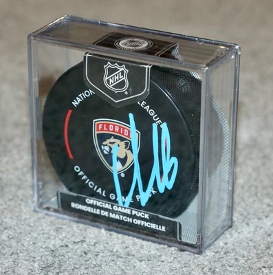 Официальная игровая хоккейная шайба с автографом АЛЕКСАНДРА БАРКОВА Panthers + сертификат подлинности BECKETT W841 - Изображение 1 из 4