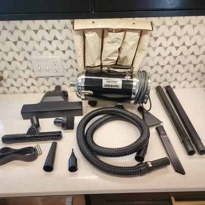 Aspiradora portátil Metro Omnivac modelo OV con accesorios. Probado Foto 1 de 4