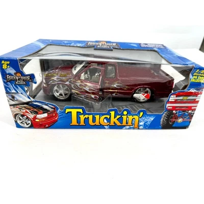 Coche coleccionable fundido a presión Badd Ride Truckin' Chevy S10 escala 1/24 serie 2 Foto 1 de 4